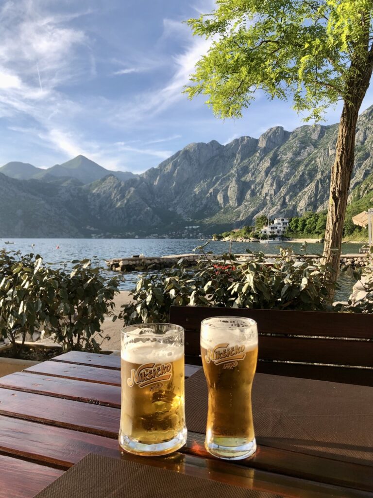 10 Most Beautiful Places in Montenegro - beers and bay background