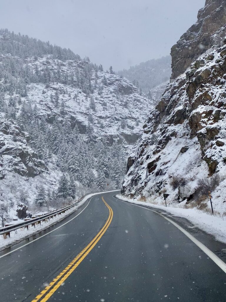 Snowy Colorado highway in winter, the most unique drive in colorado - peak to peak highway 