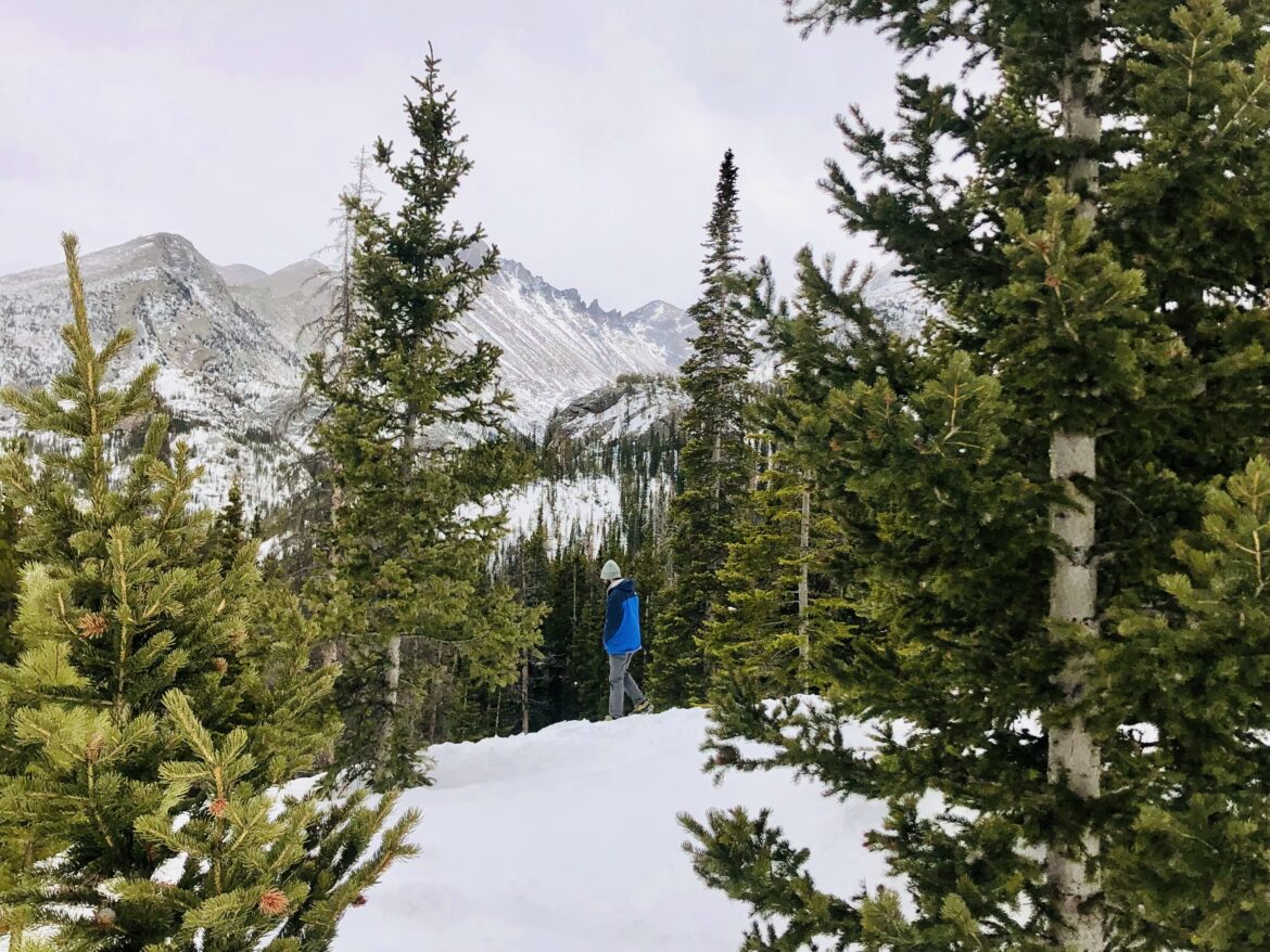 Jonathan hiking in snowy Rocky Mountain NP