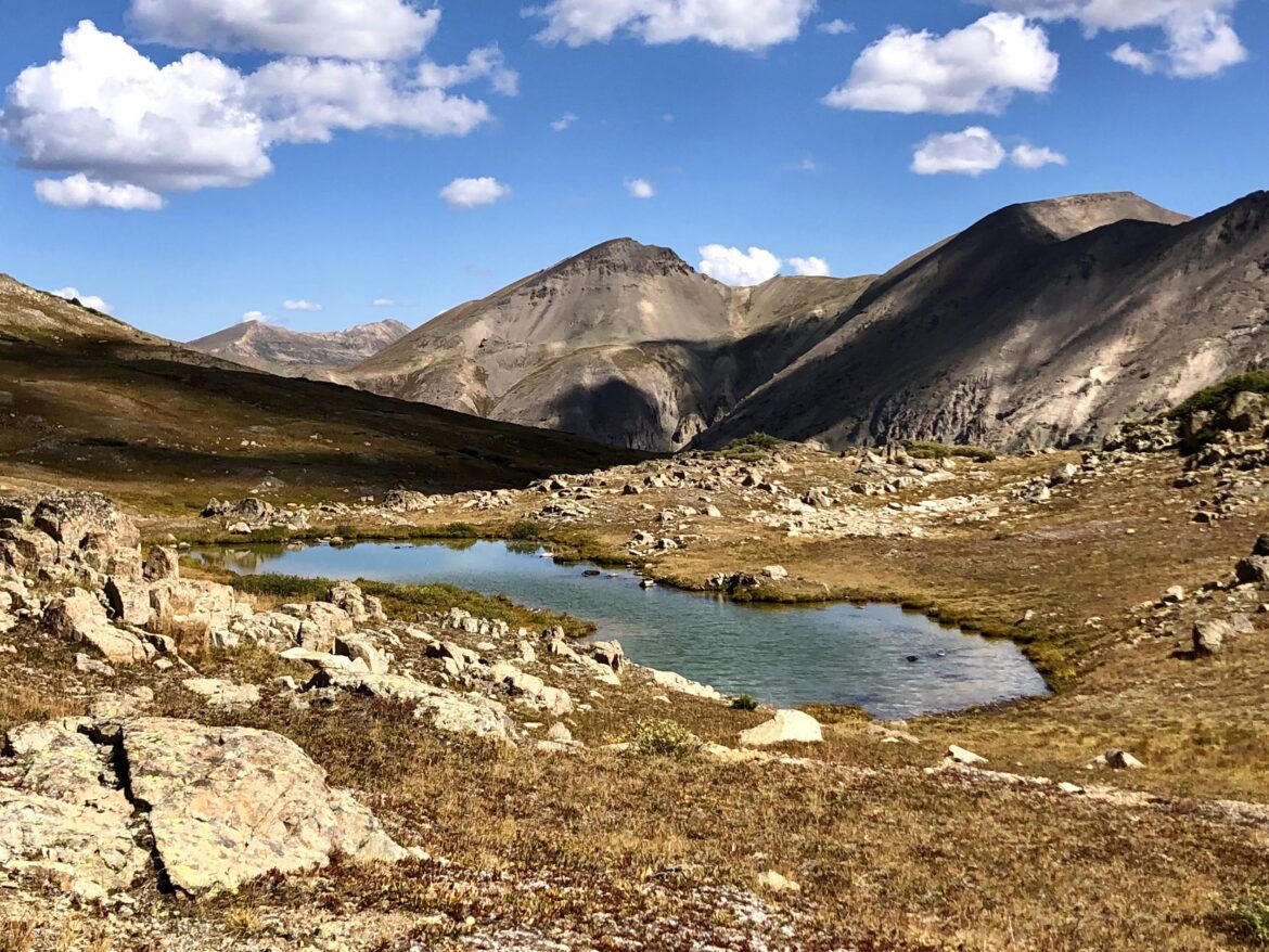 Blue Alpine Lake with Reflection with blue skies